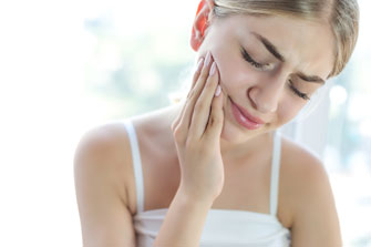 Причины боли после удаления зуба